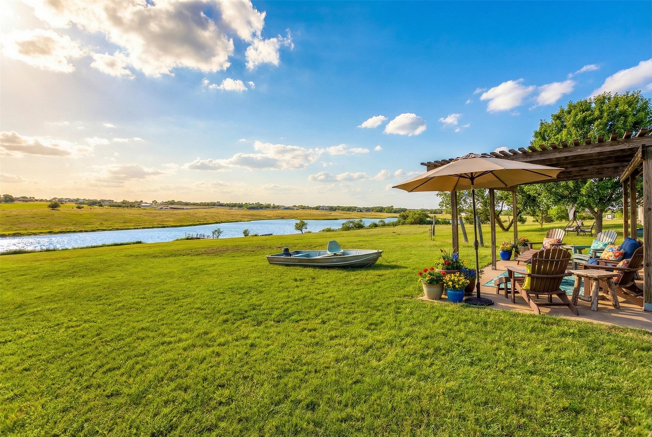 Backyard to lake with pergola